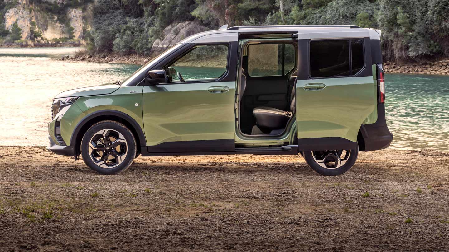 Green Tourneo Courier parked near lake