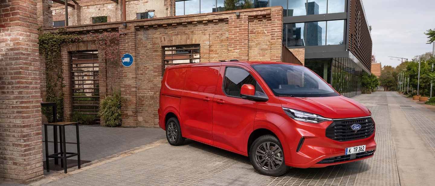 Ford E-Transit Custom in red parked