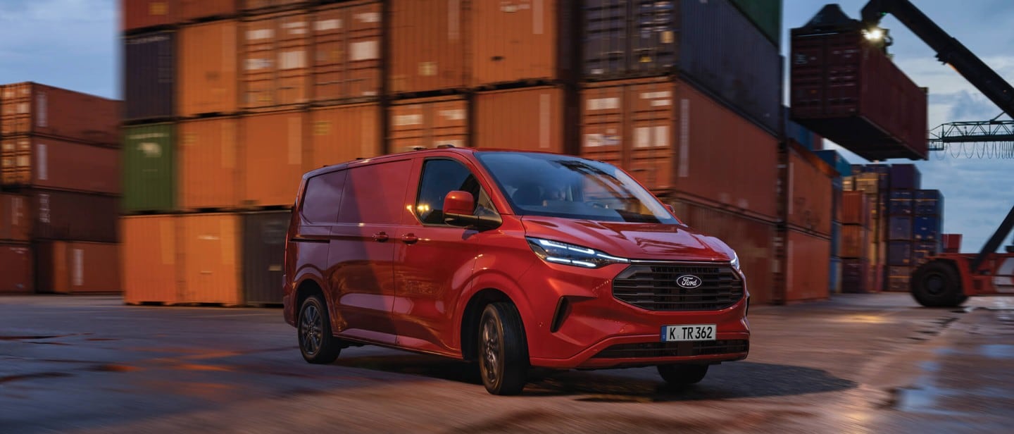 Ford E-Transit Custom in red parked