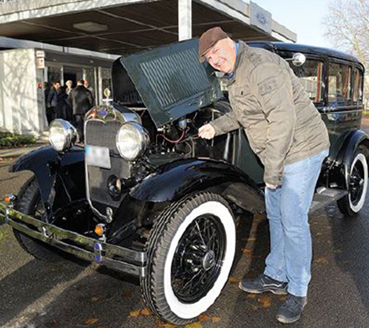 A man with a Ford veteran