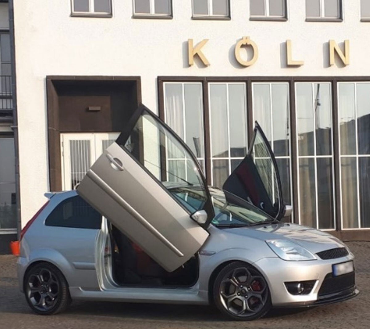 Ford car with open door