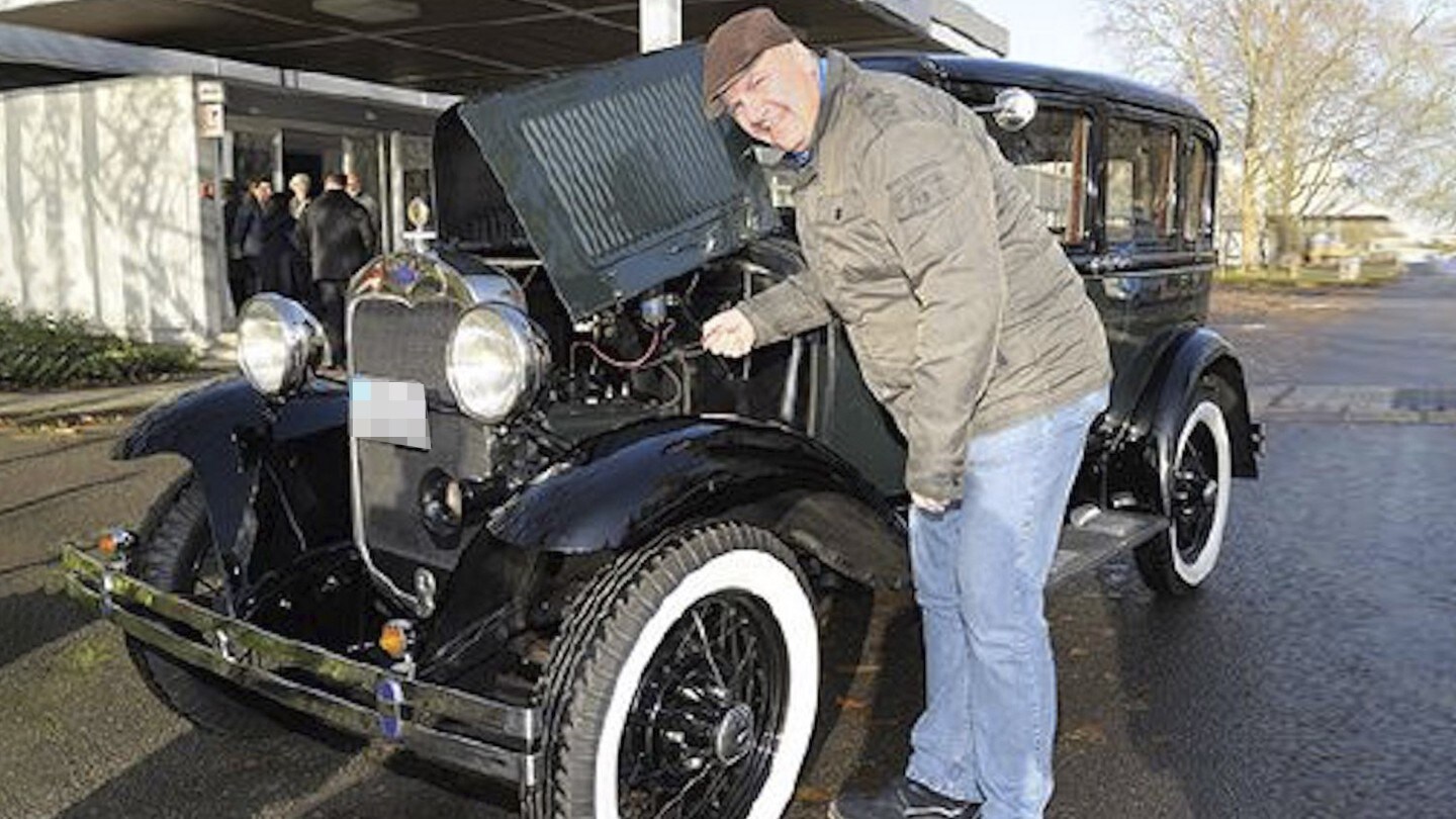 A man with a Ford veteran