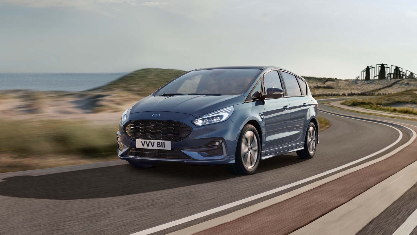 Blue Ford S-Max driving on the road