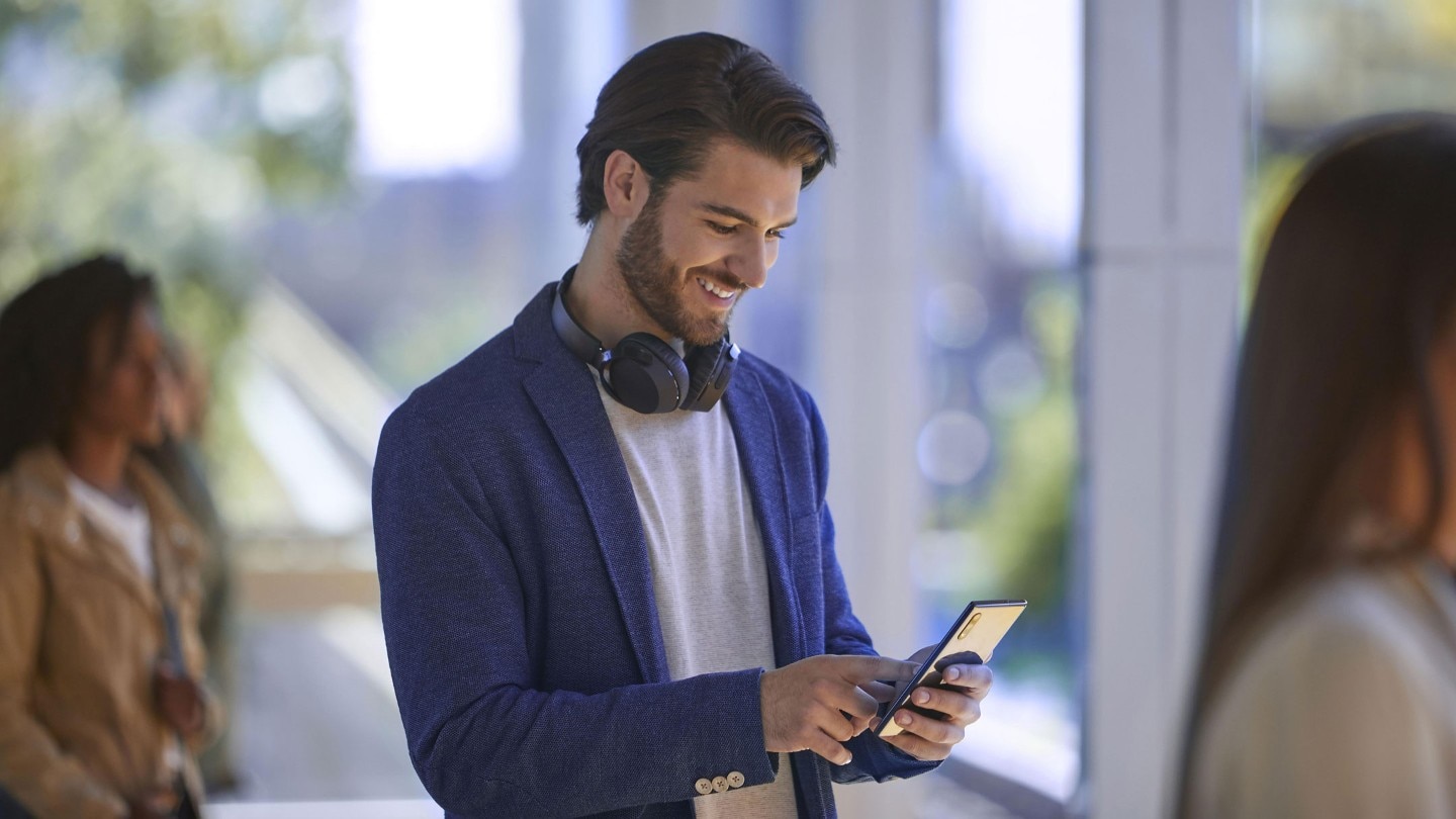 Person holding mobile phone