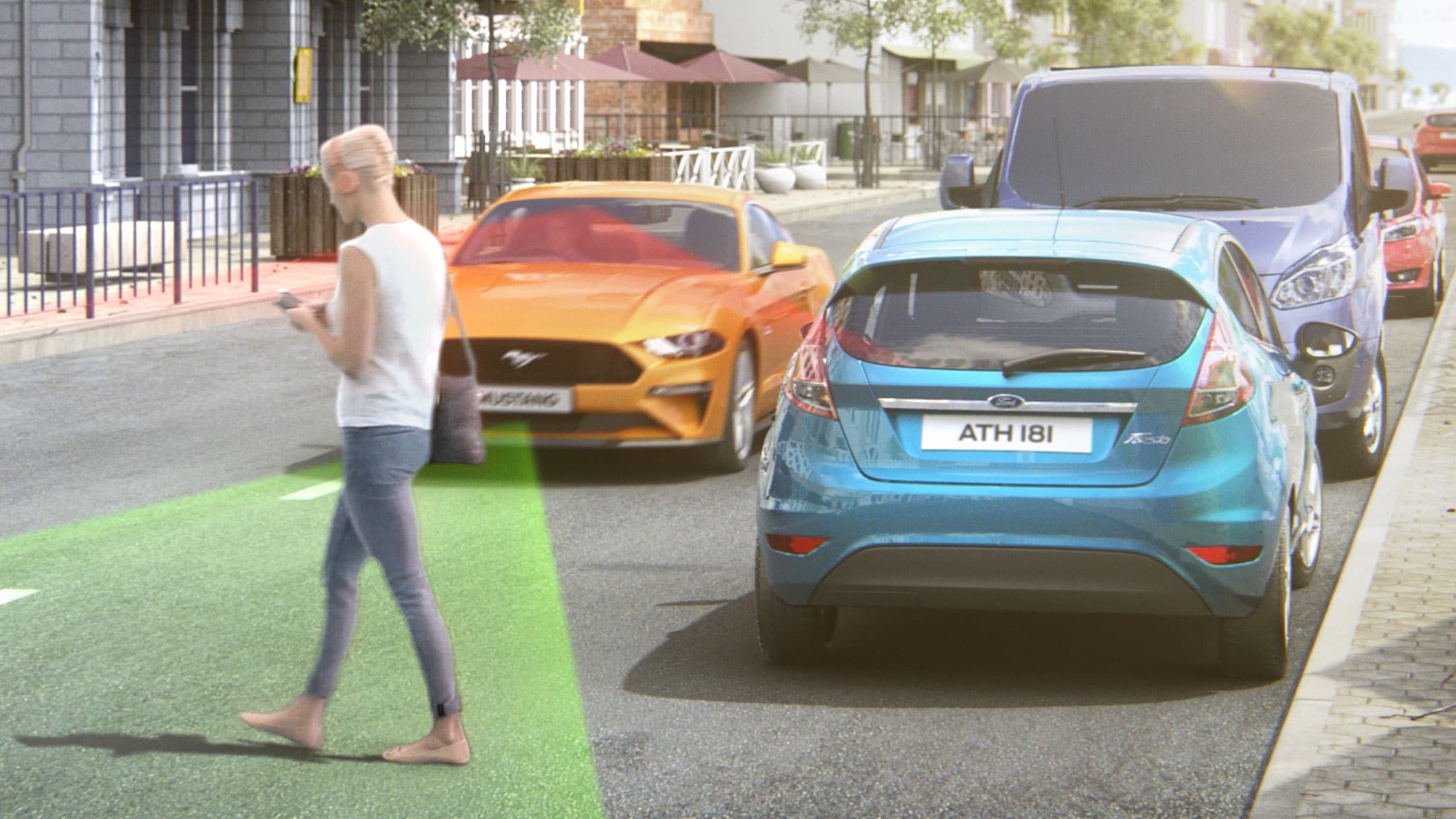 Ford Mustang in Orange. Frontalansicht, fahrend über eine Straße mit Gegenverkehr und visualisierten Pre-Collision-Assist, das einen Fußgänger erkennt
