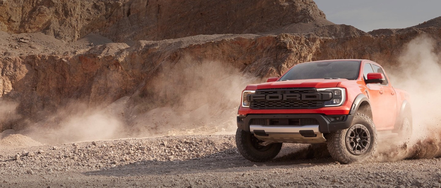 Front 3 quarter view of the Ranger Raptor driving on road