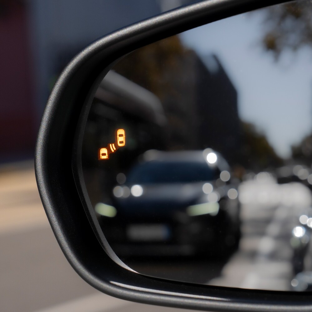 New Ford Puma using Blind Spot Information system to show cars in the blind spot.