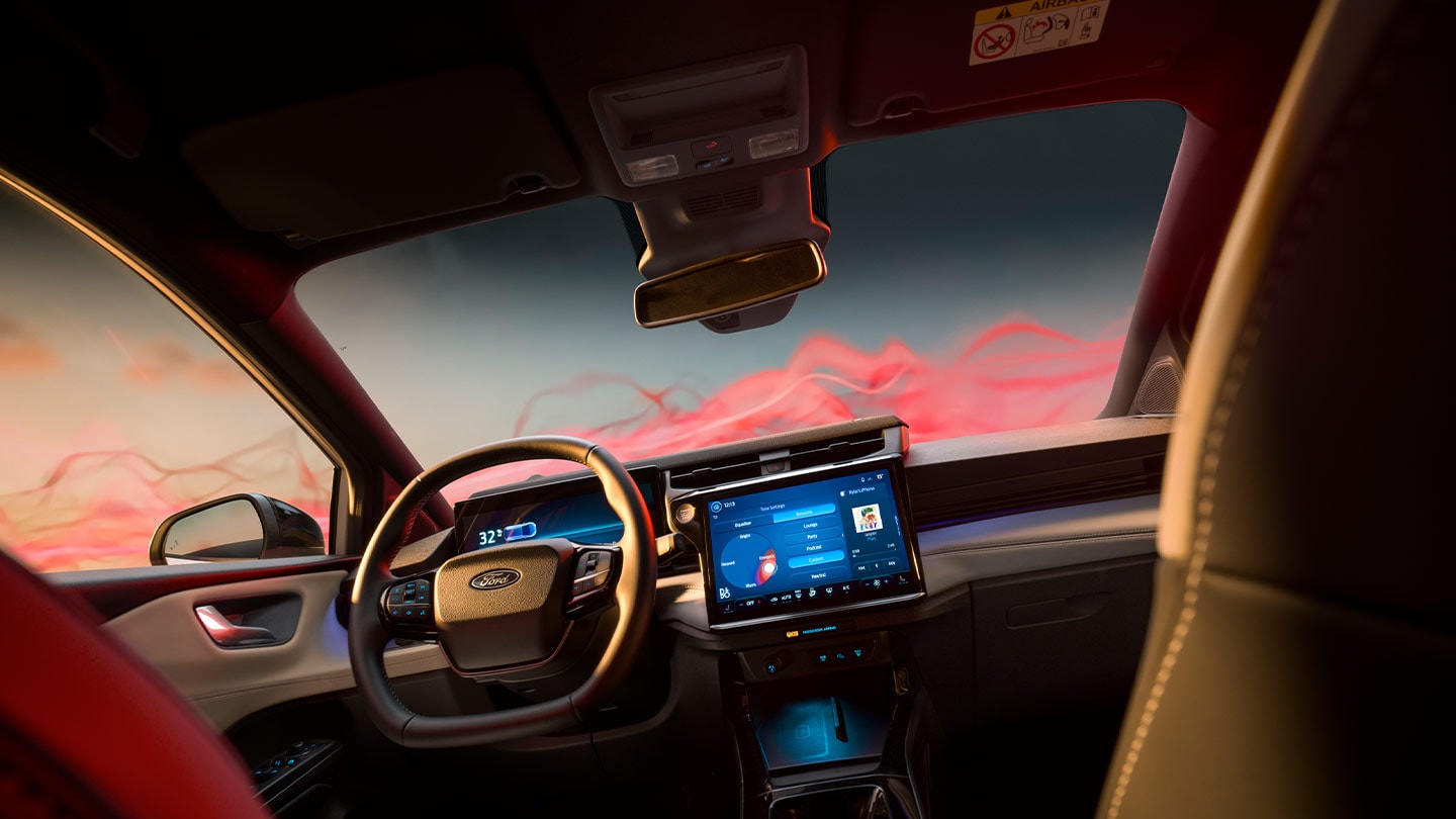 Der Innenraum der Ford Puma Sound Edition mit Lenkrad und Touchscreen.