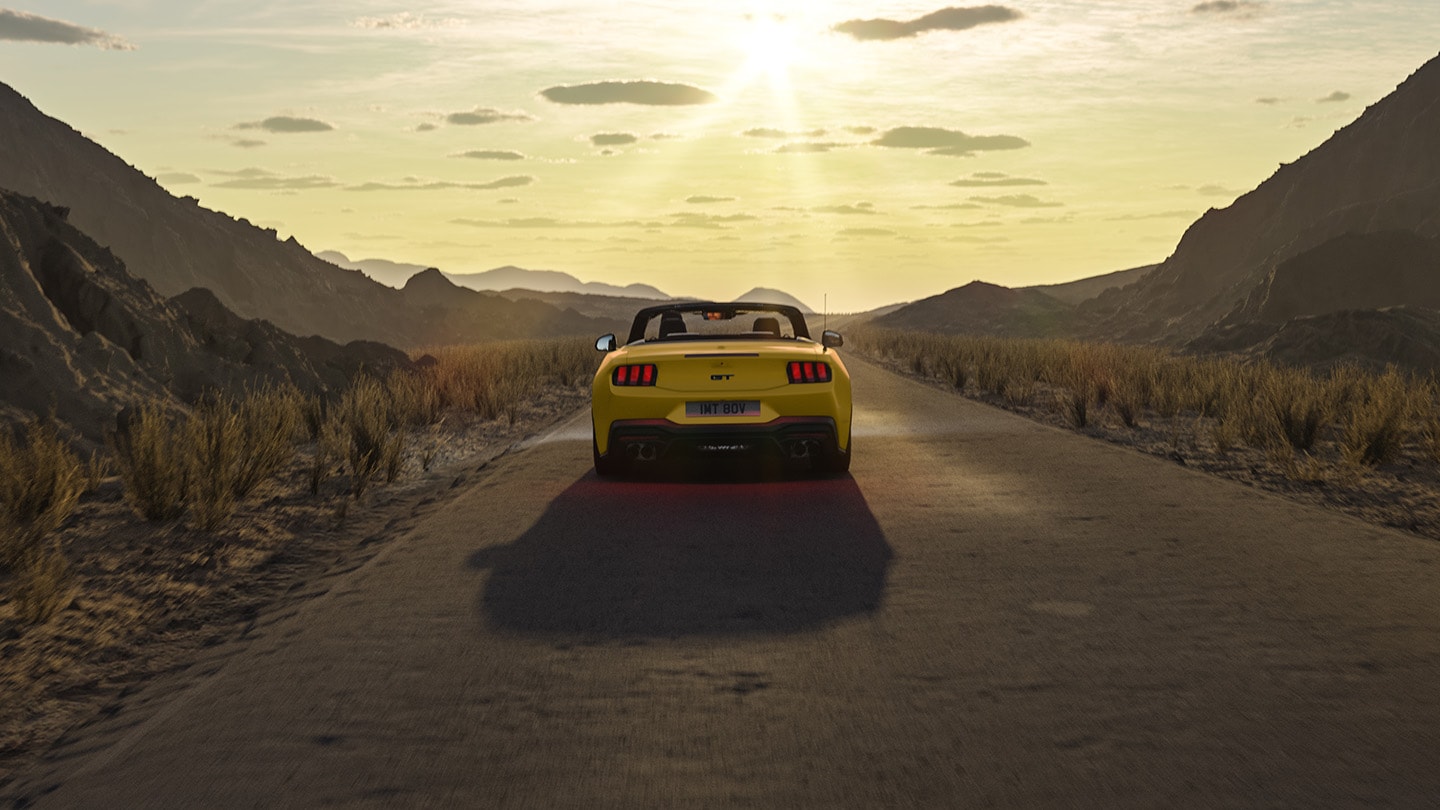 Ford Mustang driving into the sunset