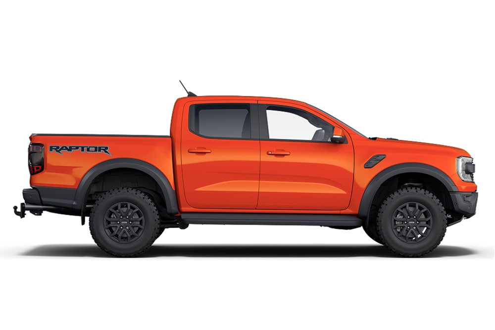 Orangefarbener Ford Ranger Raptor 4x4, Teil der Performance-Auto-Reihe von Ford.