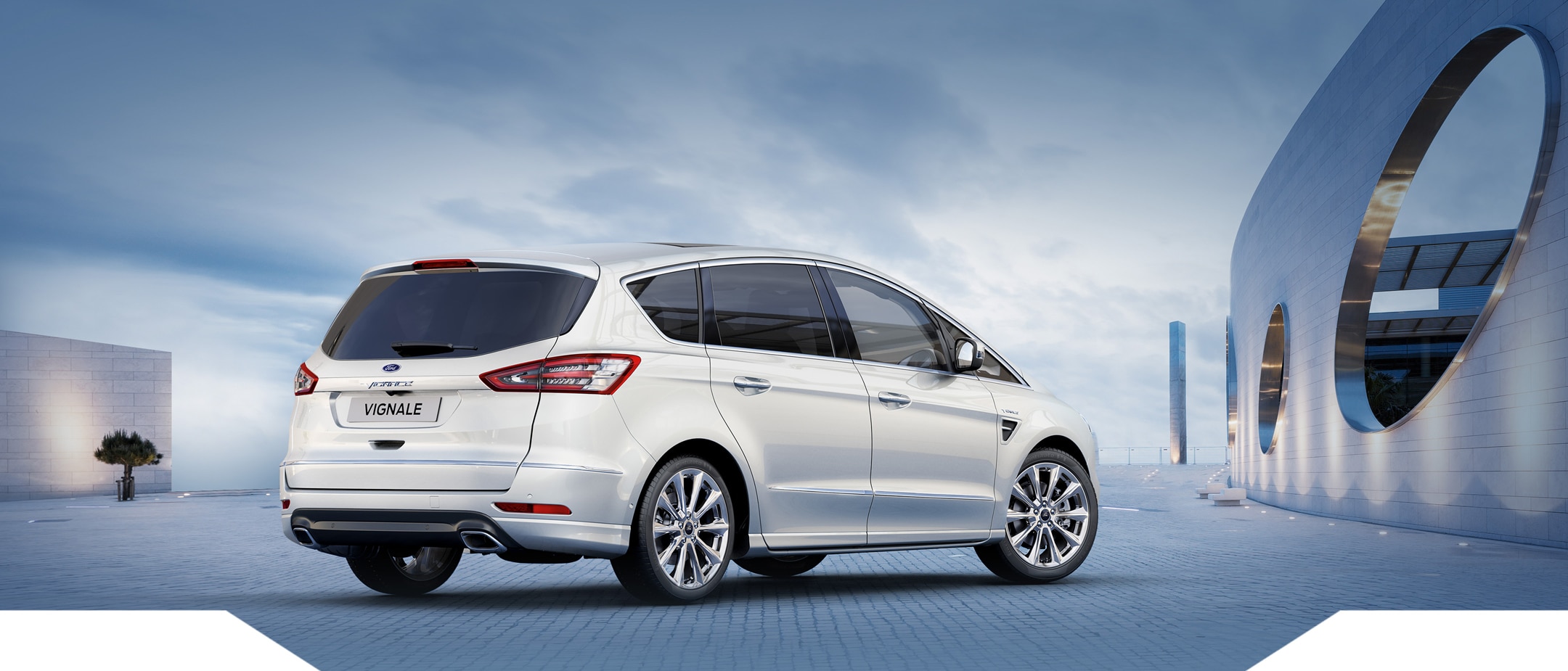 White Ford S-MAX Vignale from rear right view standing at a plaza