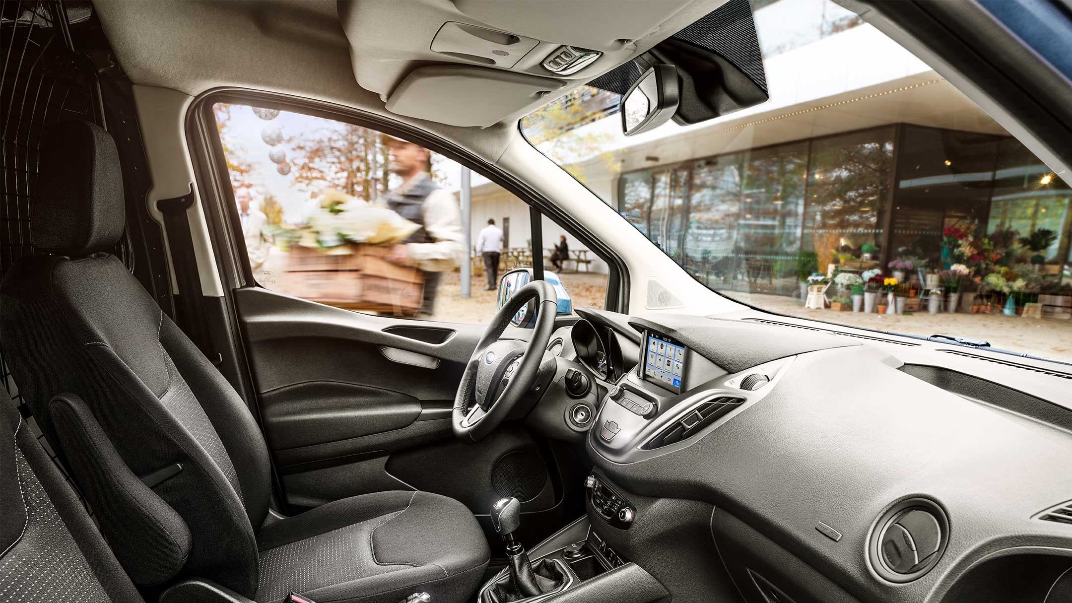 Ford Transit Courier Kastenwagen Innenraumansicht Vordersitze von Beifahrerseite