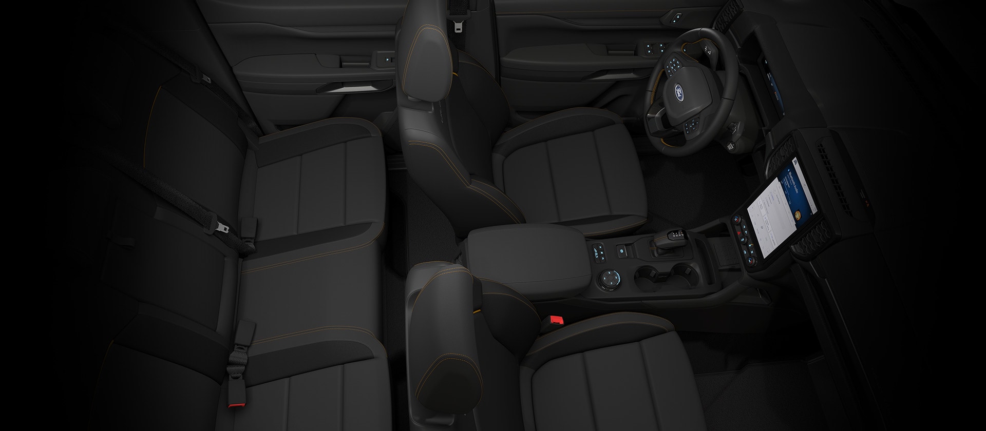 Draufsicht auf den Innenraum einer Ford Ranger Doppelkabine, die den Armaturenbrett zeigt.