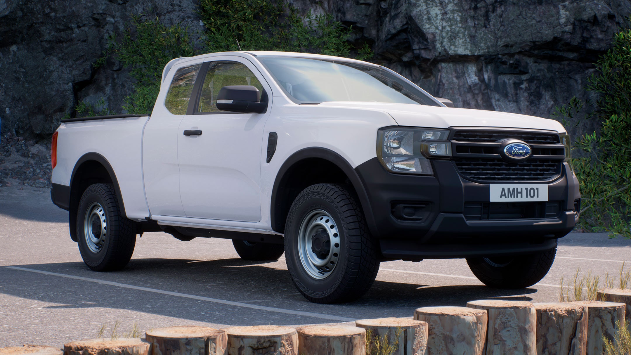 Ford Ranger in Weiß in der ¾-Frontansicht parkt auf Parkplatz im Gebirge