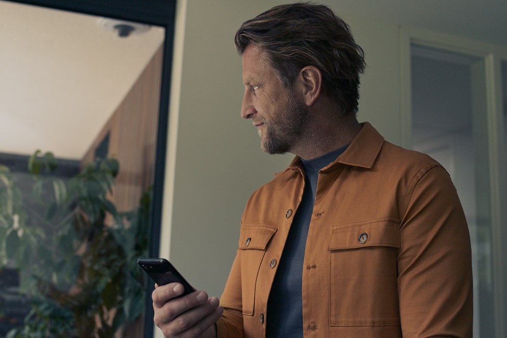 Ford Customer Using a Mobile Device