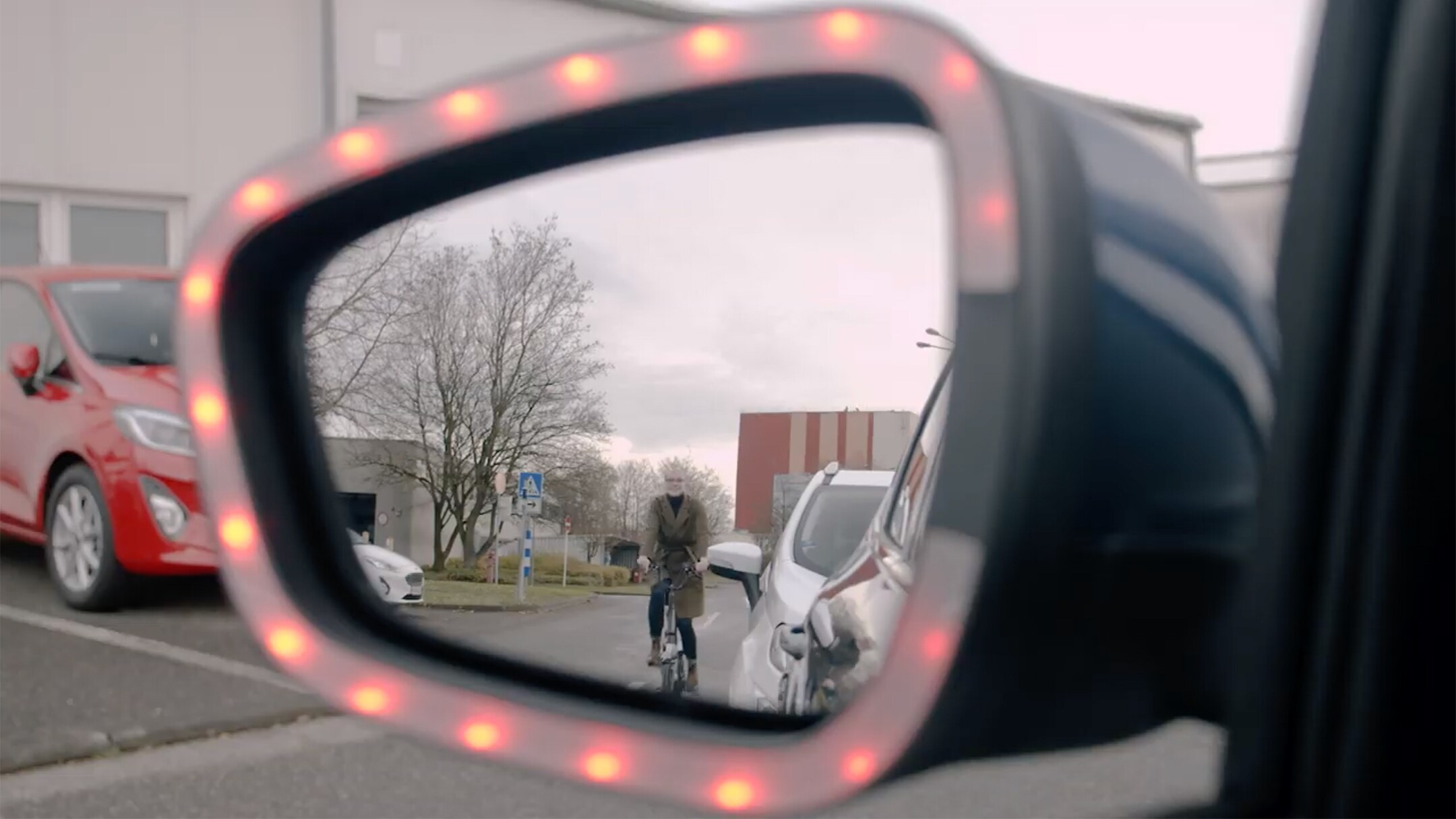 Exit warning technology being displayed on wing mirror